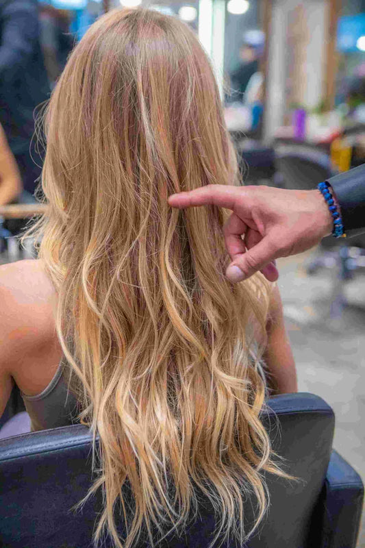 Soft blonde waves after a color service at Avant-Garde Salon & Spa in Coral Gables